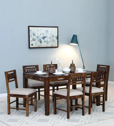 Classic teak dining set with traditional leg carvings and carved backrest chairs