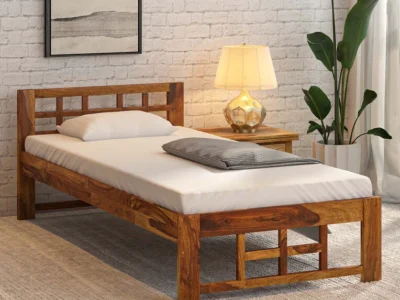 Handcrafted wooden single bed with strong legs and natural finish by Sarve Furniture – durable solid wood bed