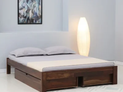 DreamNest Sheesham Wood Bed by Sarve Furniture showcasing built-in storage drawers and elegant finish.