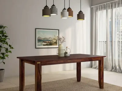 Large Sheesham wood dining table with thick top and strong frame for family use