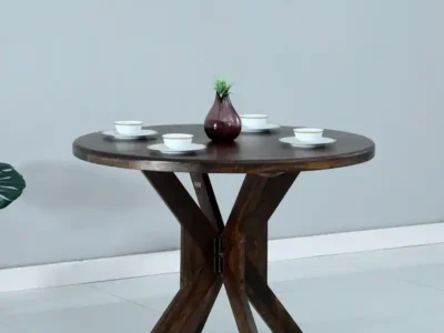 Round wooden dining table with space-saving design for modern dining rooms