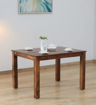 4 seater dining table with elegant cross legs and smooth wood finish