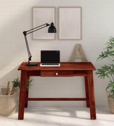 Functional study table with integrated bookshelf and cable access hole for organized and efficient workspace