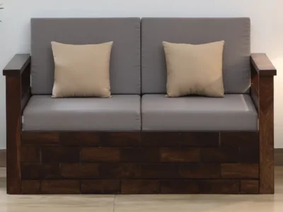 Designer 2 seater sofa with plush fabric and strong wooden legs