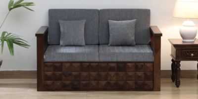 Handcrafted 2 seater Sheesham wood sofa in provincial teak finish by Sarve Furniture