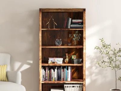 Traditional Sheesham wooden bookcase with carved side panels and natural polish by Sarve Furniture