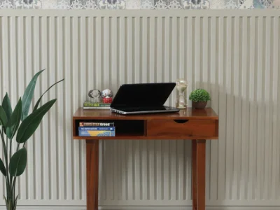 Sturdy study desk with laminated finish and spacious drawer for stationery
