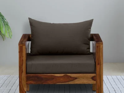 Classic single seater sofa with tufted back and fabric upholstery