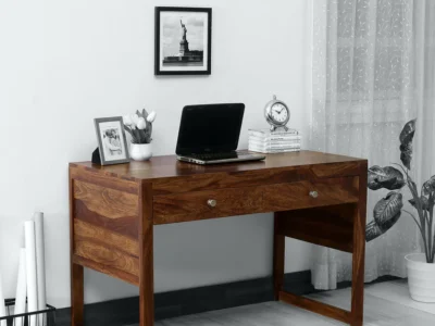 Adjustable height study desk for kids with book rack and storage compartments