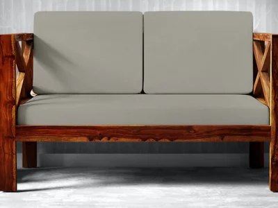Stylish 2 seater sofa with neutral fabric and wooden legs