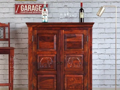 Traditional wooden bar unit Carved bar cabinet with storage Home bar furniture in wood Handcrafted wooden bar unit Designer bar cabinet with doors Wooden wine bottle cabinet Antique-style bar unit Wooden bar furniture with rack Bar unit with carved details Solid wood liquor cabinet