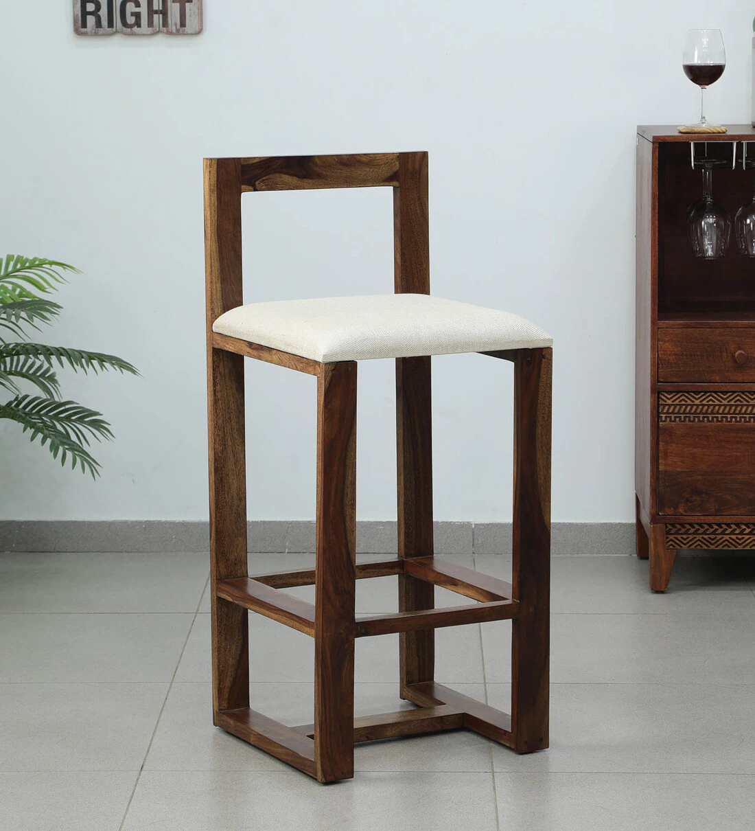 Designer bar stool with cushion Bar chair with padded seat Modern wooden bar chair Bar seating with wooden legs Upholstered bar chair for home Elegant bar chair design Soft seat bar stool Contemporary bar chair style High stool for bar counter Designer wooden bar furniture