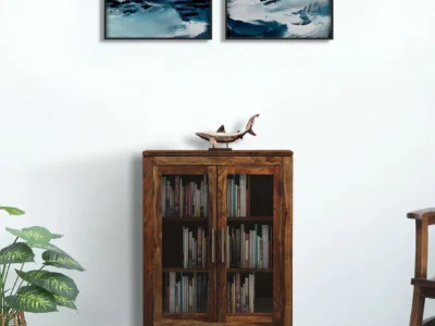 Solid Sheesham wood bookshelf with hand-carved floral motifs and polished finish by Sarve Furniture