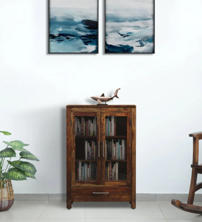 Solid Sheesham wood bookshelf with hand-carved floral motifs and polished finish by Sarve Furniture