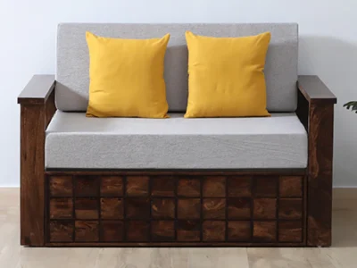 Elegant tufted sofa cum bed with hidden storage compartments