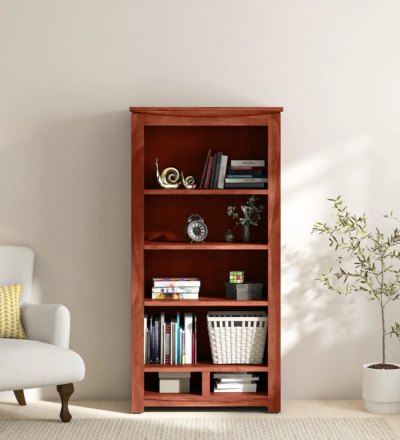 Solid Sheesham wood bookshelf with spacious shelves and traditional decorative carving by Sarve Furniture