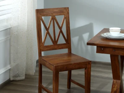 Kshetra solid wood dining chairs set of 2 by Sarve Furniture for compact dining spaces Compact space dining chair set – Kshetra wooden chairs (Set of 2) by Sarve Furniture Kshetra space-saving wooden dining chairs by Sarve Furniture, perfect for small homes Set of 2 Kshetra solid wood dining chairs by Sarve Furniture for minimalist interiors Kshetra dining chairs for tight spaces, made from solid wood by Sarve Furniture