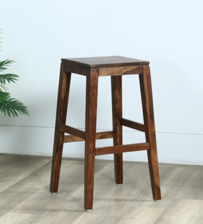 Eclipse Sheesham wood bar stool by Sarve Furniture with natural finish Close-up of handcrafted Eclipse Sheesham wood bar stool seat Stylish Eclipse Sheesham bar stool with ergonomic backrest Eclipse Sheesham wood bar stool featuring rich wood grain texture Side view of Eclipse Sheesham wood bar stool with footrest Sleek and modern Eclipse Sheesham wood bar stool design Full view of Eclipse Sheesham wood bar stool in contemporary space High-quality Eclipse Sheesham wood bar stool with natural polish Handcrafted Eclipse bar stool made from solid Sheesham wood Rustic and elegant Eclipse Sheesham bar stool with smooth finish
