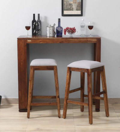 Monarch bar table set with 2 grey cushioned stools – Sarve Furniture Monarch bar table and stools in grey and wooden finish – front view Close-up of grey cushioned bar stools from Monarch set Monarch bar table with sleek top and soft padded stools Monarch set with grey upholstery – ideal for modern kitchens Monarch bar table with supportive cushioned seating – Sarve Furniture Side view of Monarch bar table set with stool detailing Monarch table and stools in a contemporary dining setup Monarch bar table set with soft grey cushions and dark wood Stylish and functional Monarch cushioned bar set for small spaces