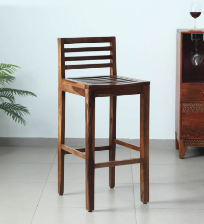 Bar stool with natural finish Solid Sheesham bar seating Wooden bar chair for home Natural grain wood stool Rustic wood bar stool High chair for bar counter Sheesham wood kitchen stool Comfort seat wooden stool Designer bar stool in wood Home bar furniture stool